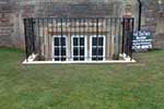 After photo showing the installation of the mullion window in Doulting stone and creation of light well.